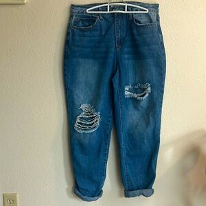 Woman’s stretchy distressed jeans